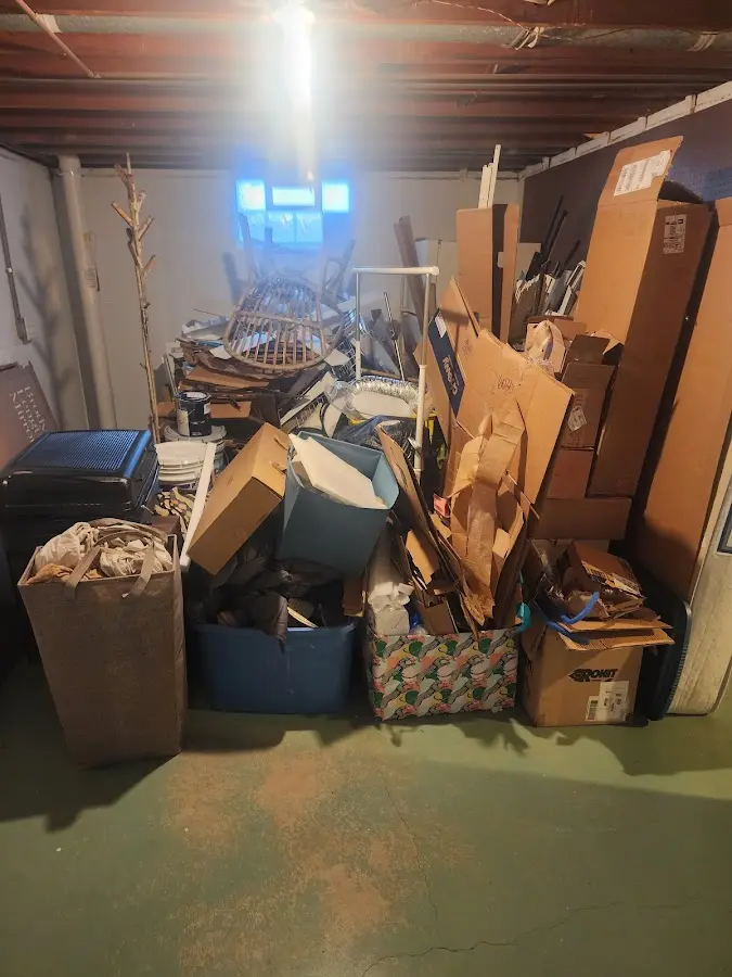 Roll-off dumpster container at job site for 2 Yard Dumpster Rental in Webster